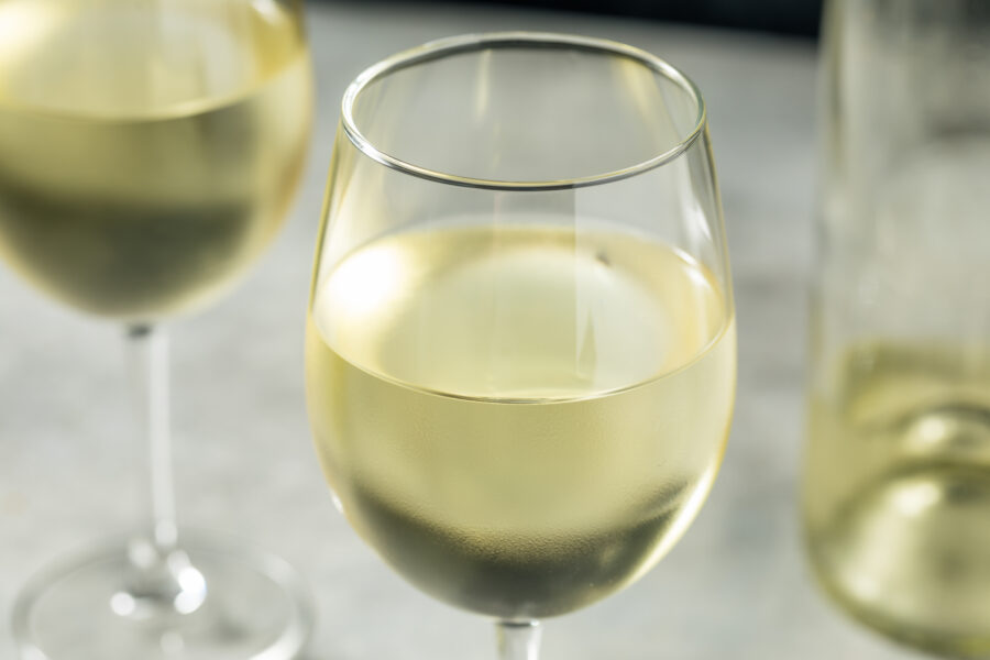 two-glasses-of-white-wine-on-table
